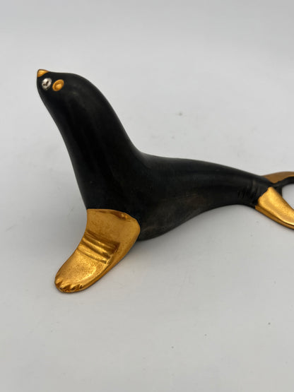 Décapsuleur otarie noir et or