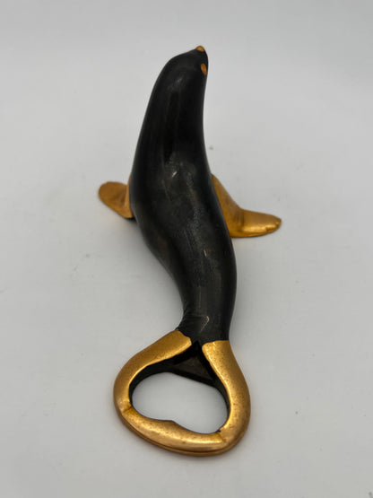 Décapsuleur otarie noir et or